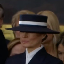 Melania Wif Hat 's logo
